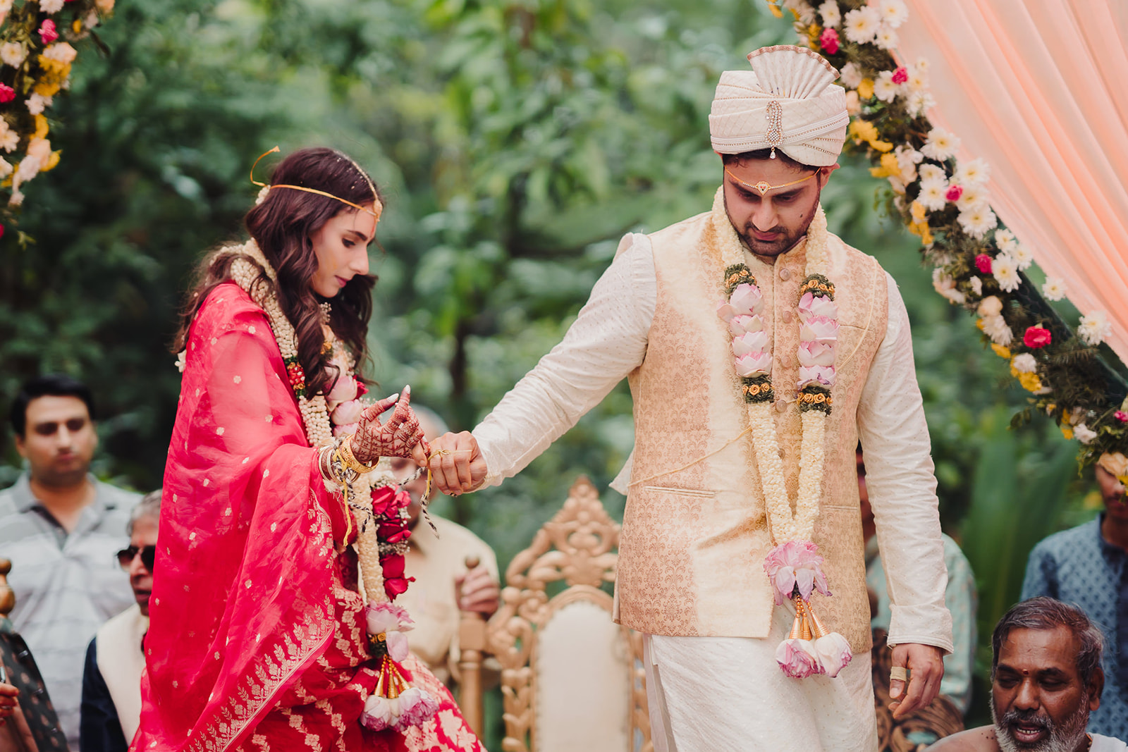 Bride and groom take pheras in the wedding ceremony