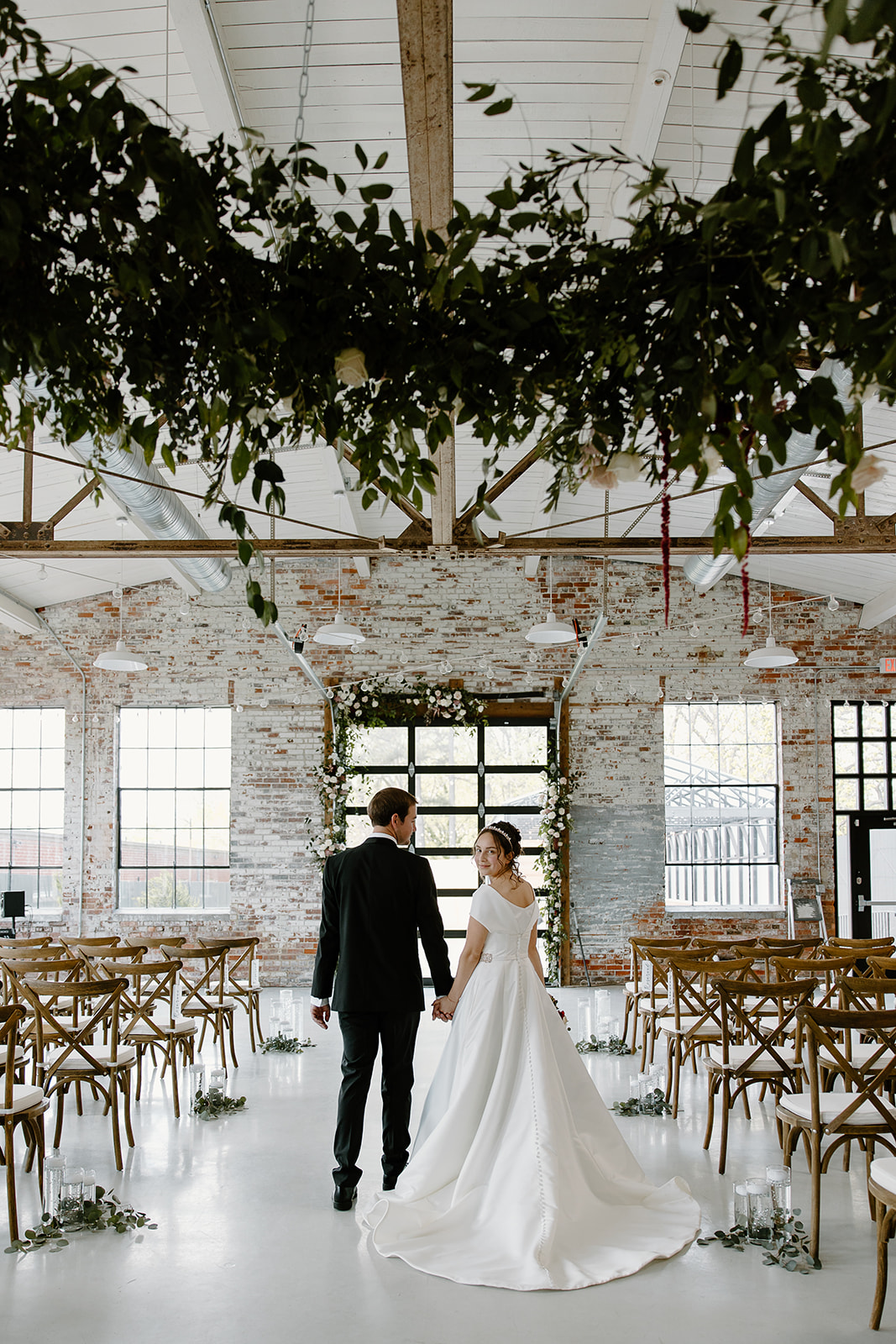 Wedding photos at The Graham Mill, a North Carolina wedding venue, capture by NC wedding photographers and videographers