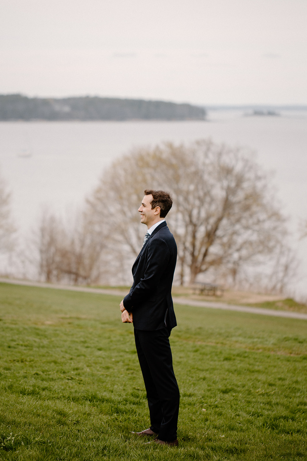 A groom waits to see his bride at the Eastern Promenade in Portland, Maine