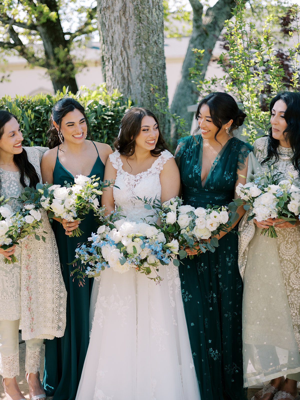 morais vineyard winery virginia bealeton wedding bridesmaids mismatched dresses white rose blue flowers bouquet