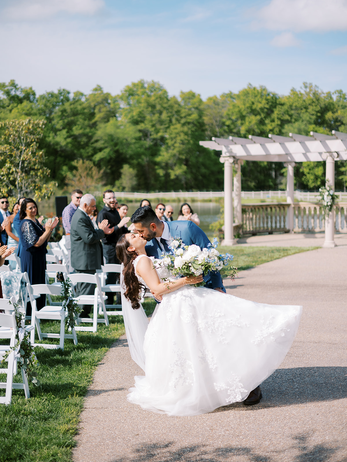 morais vineyard winery virginia bealeton wedding bride and groom just married dip kiss aisle a line wedding dress floral