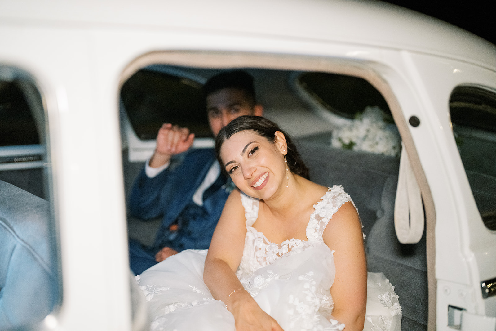 morais vineyard winery virginia bealeton wedding just married bride and groom exit bubbles blowing cute vintage car