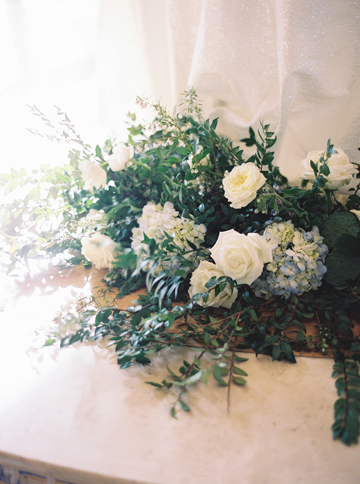 morais vineyard winery virginia bealeton wedding white rose flowers blue florals magical dreamy floral arrangements idea