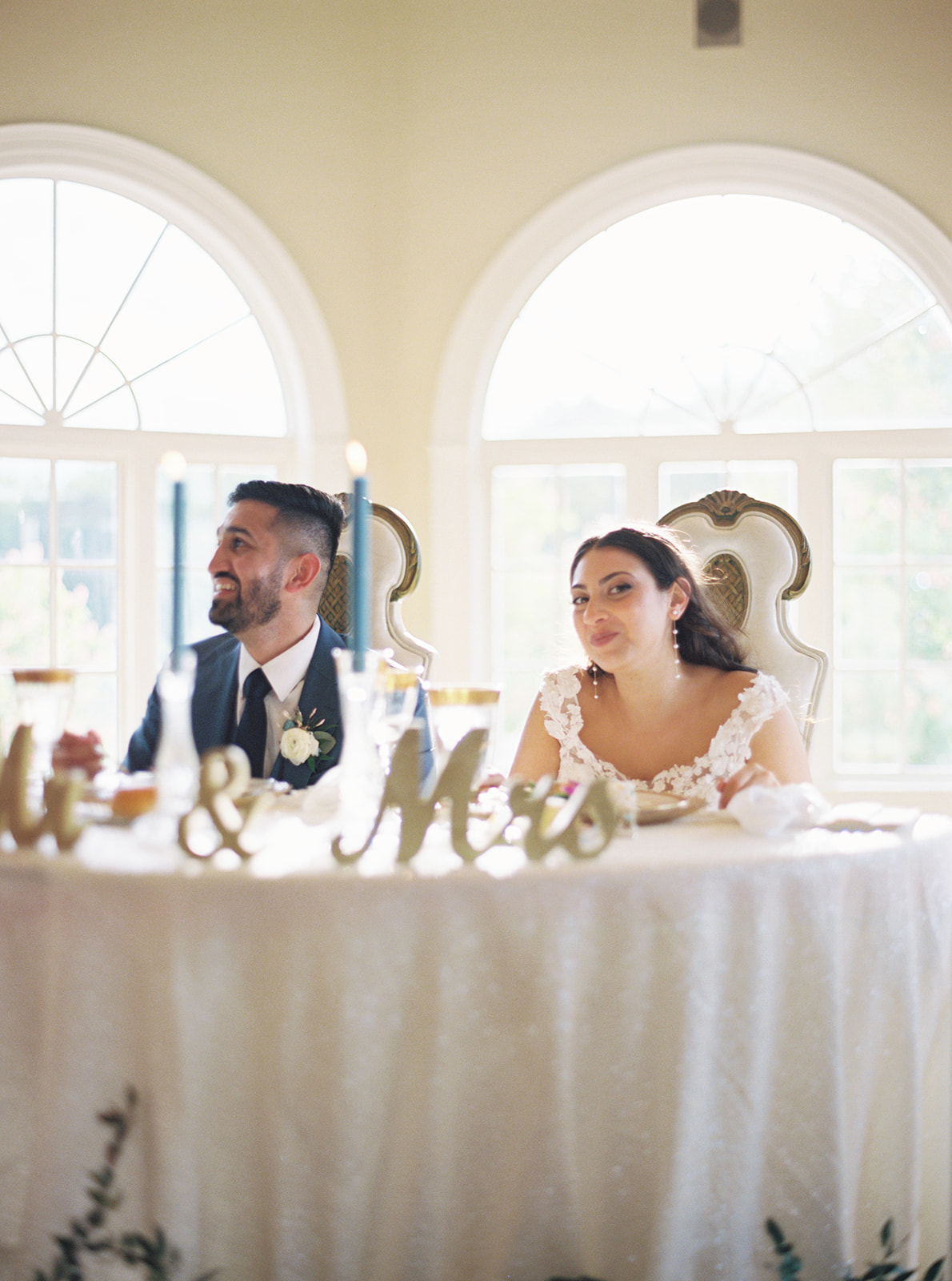 morais vineyard winery virginia bealeton wedding bride and groom table the palacio wedding dinner toast indoor reception