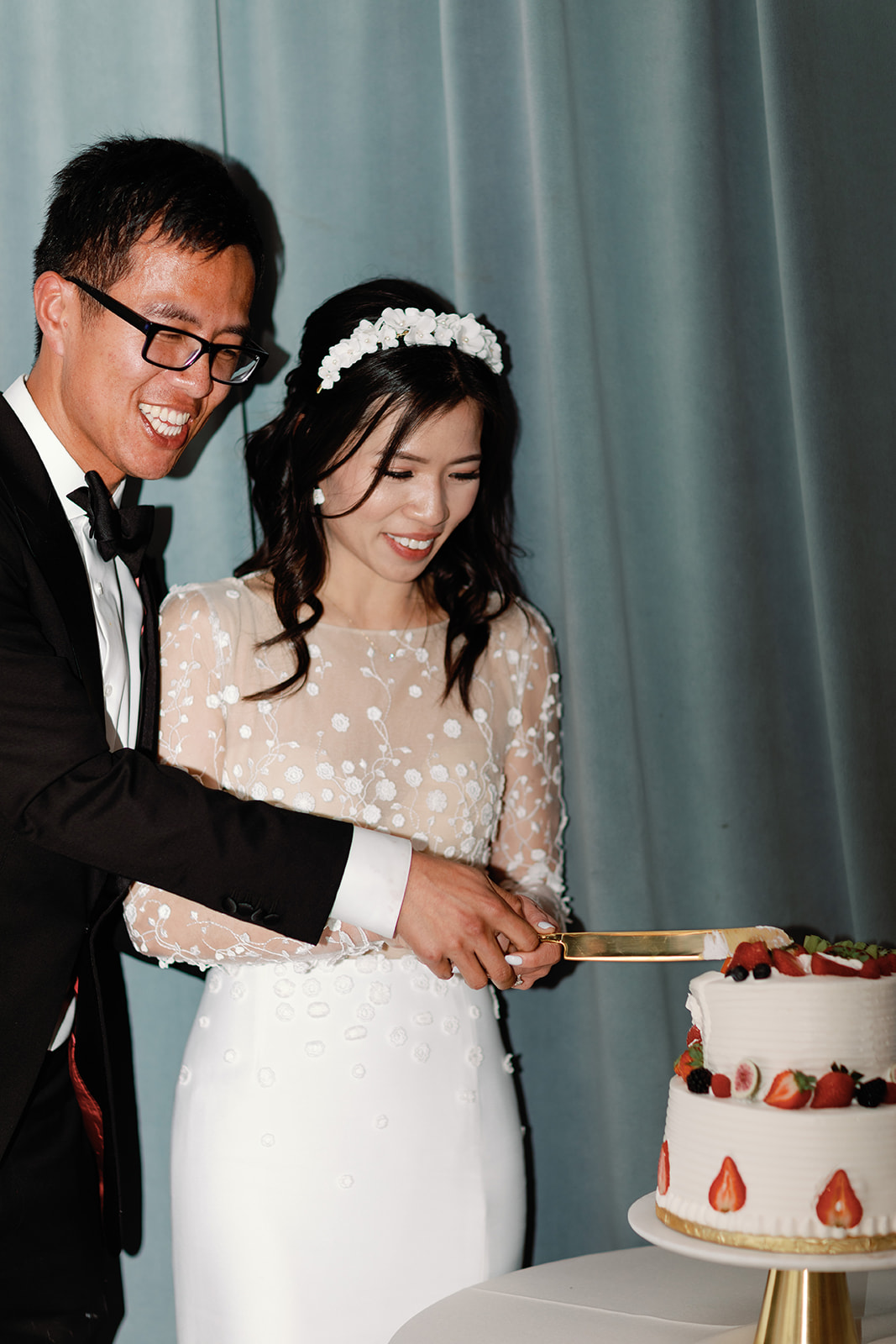 Conservatory of Flowers wedding reception cake cutting
